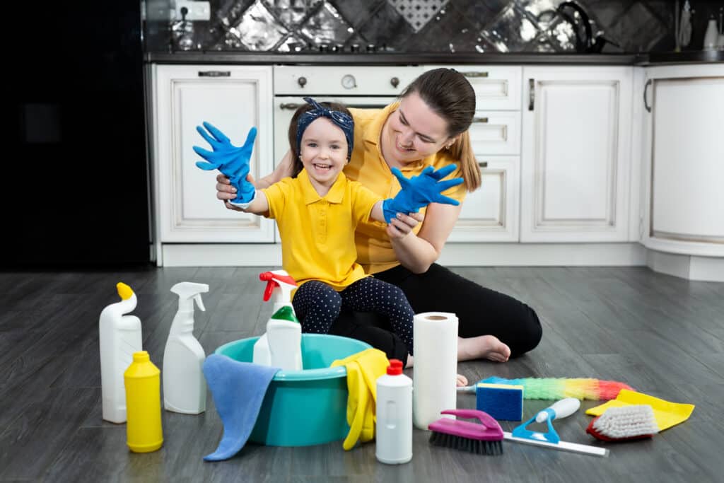 happy-mother-and-her-daughter-put-on-rubber-gloves-2022-04-19-23-31-52-utc-1024x683