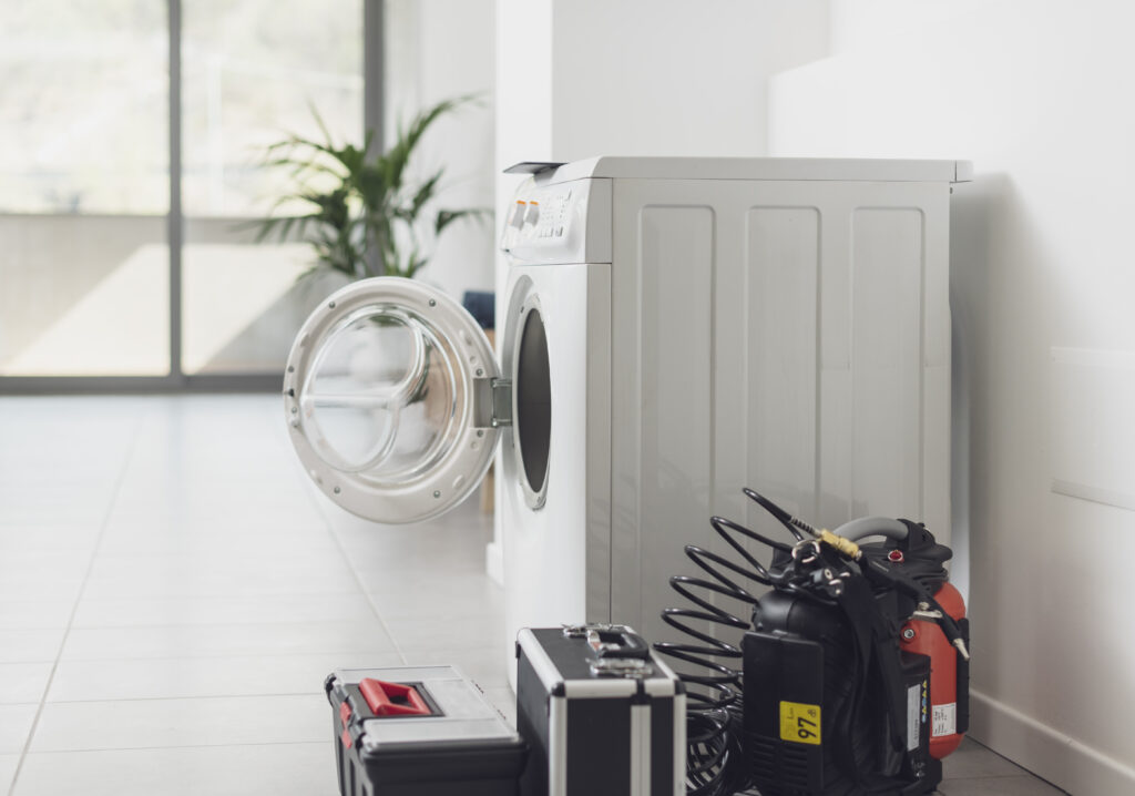 Professional tools and washing machine: repairman service concept